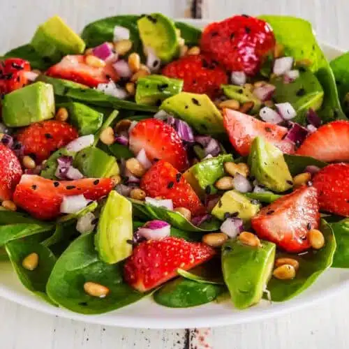 Delicious Strawberry Poppy Seed Salad With Avocado And Baby Spinach